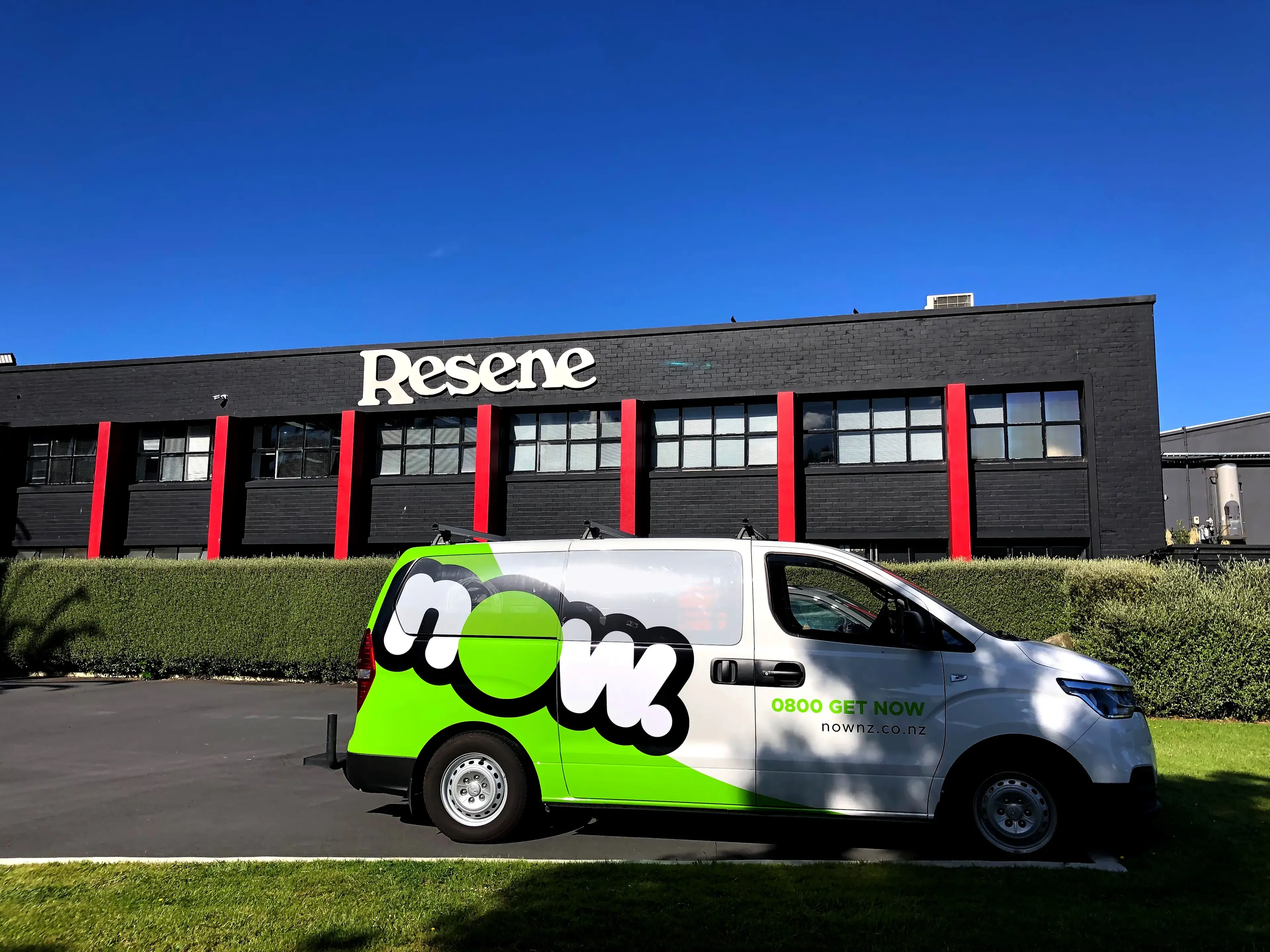 A Now NZ service van parked in front of a Resene building, highlighting Now NZ's role in upgrading Resene's telecommunications and technology to improve their agility.