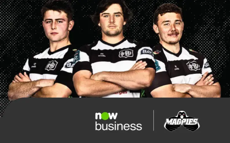 Three Magpies rugby players in black and white jerseys, representing Now Business's sponsorship of Hawke's Bay Rugby.